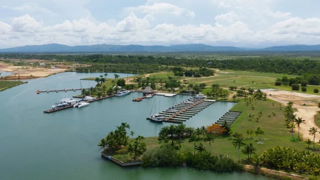 Aerial view of Red Rock Marina — deep-water slips in a mangrove-protected harbour
